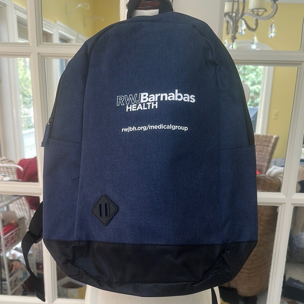Brand new basic canvas, backpack, zip closure, navy blue, and black